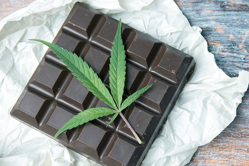 Cannabis chocolate bar with a leaf on top