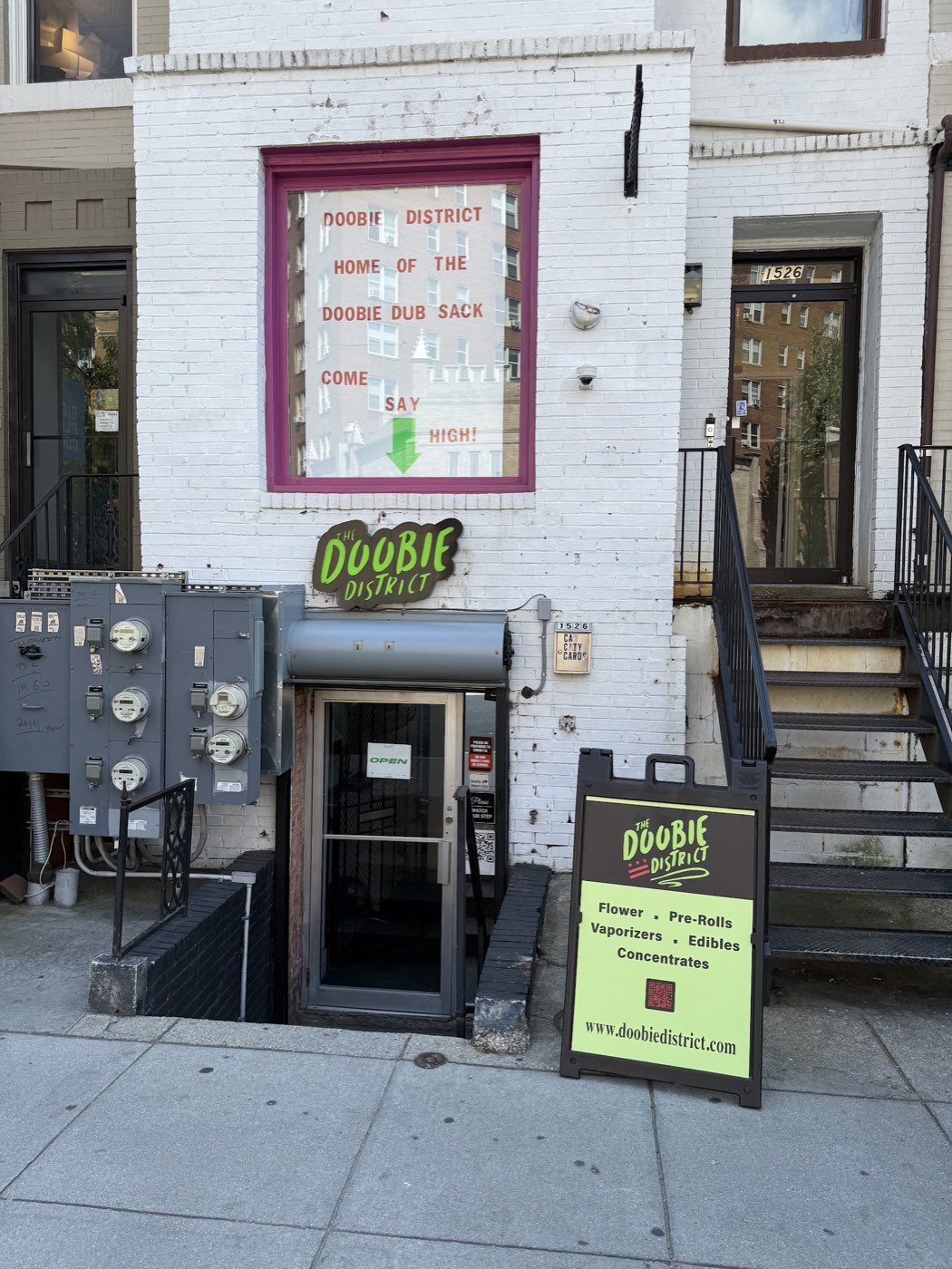 Steps down from the U Street sidewalk to the Doobie District basement entrance